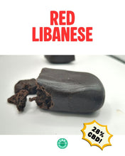 Load image into Gallery viewer, Close-up of Red Libanese CBD Hash showing soft plasticine-like consistency and oily resin